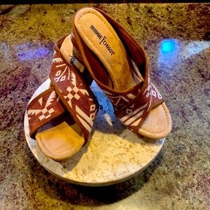Minnetonka Women’s 3 inch crossband and wedge sandals with fabric upper